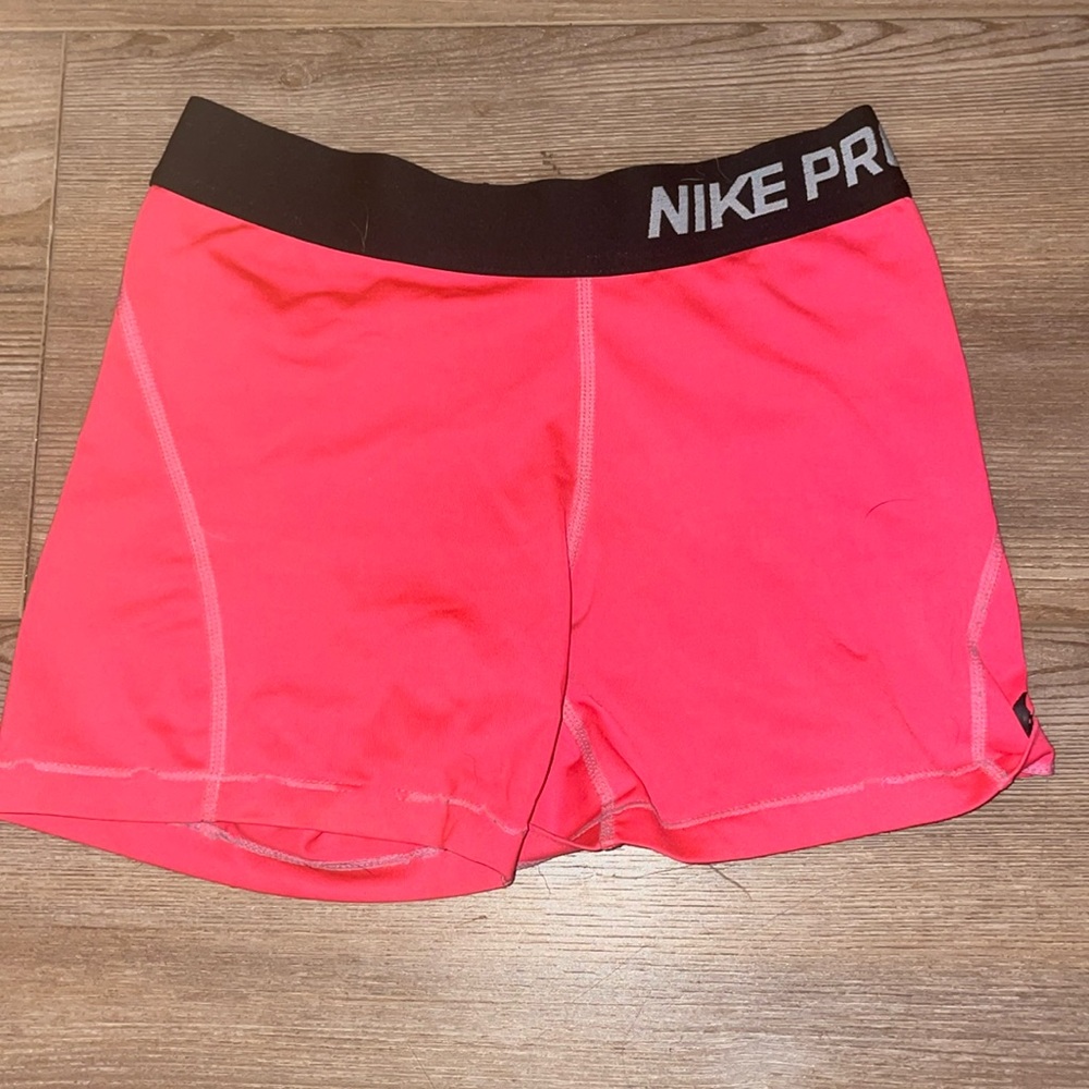 hot pink nike pros size M